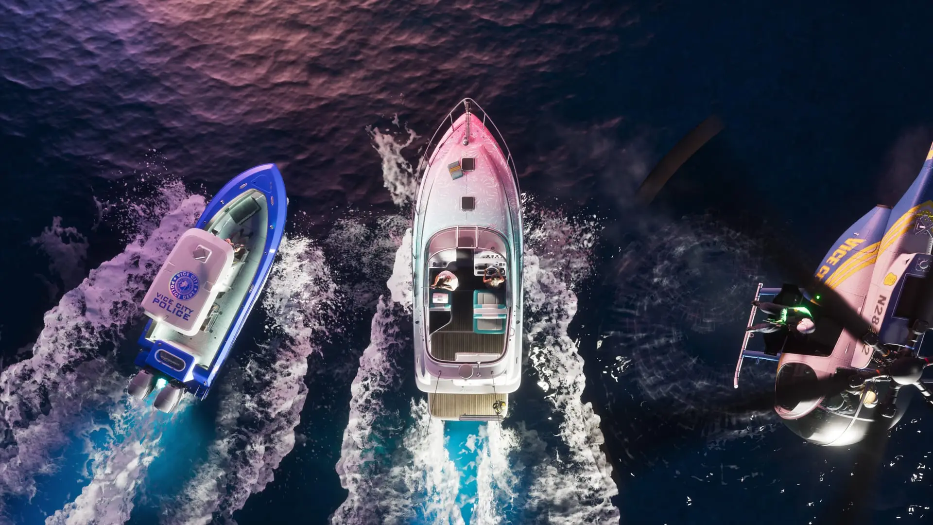 Aerial view of three boats speeding across dark water at night: a blue speedboat, a white and pink yacht, and a jet ski.