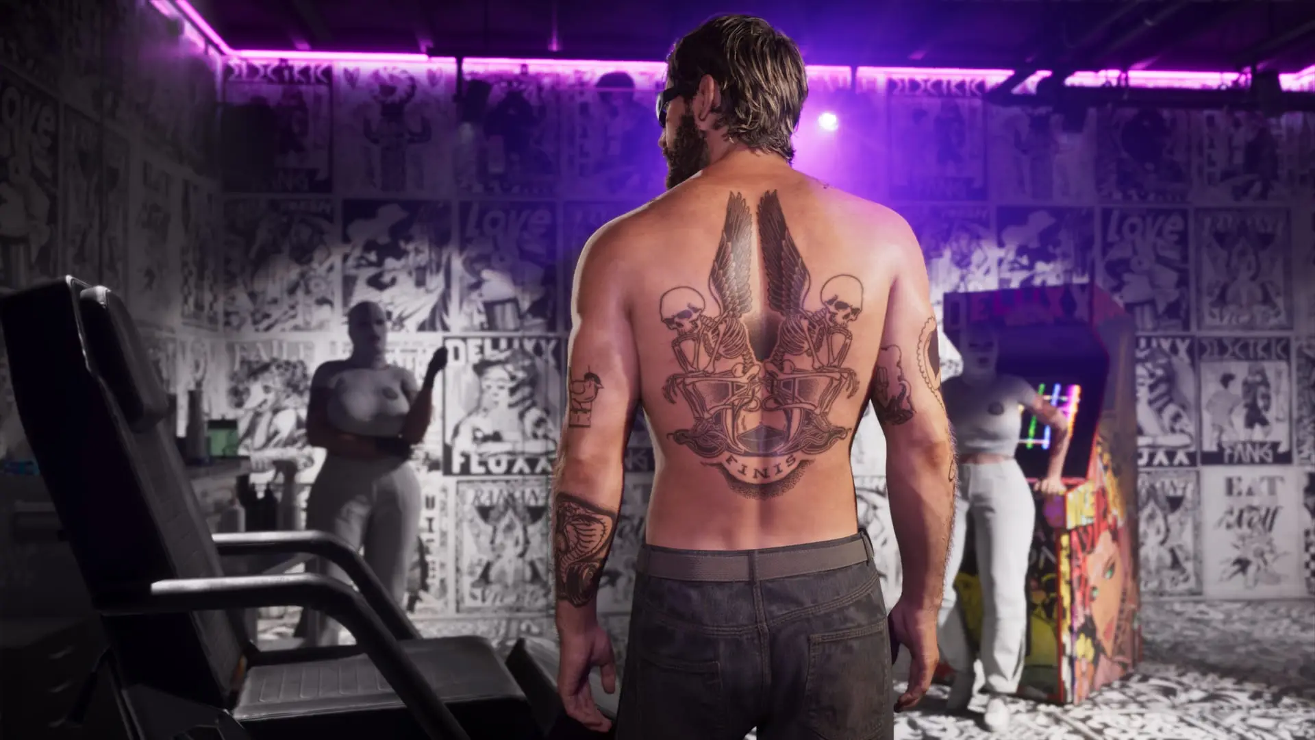 Shirtless man with a large back tattoo stands in a purple-lit room with graffiti-covered walls and an arcade cabinet.